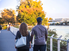 Couple walking along theGeorgetown Waterfront - Romantic spots in Washington, DC