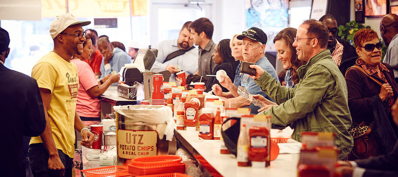 Down a chili-smothered half-smoke at Ben's Chili Bowl
